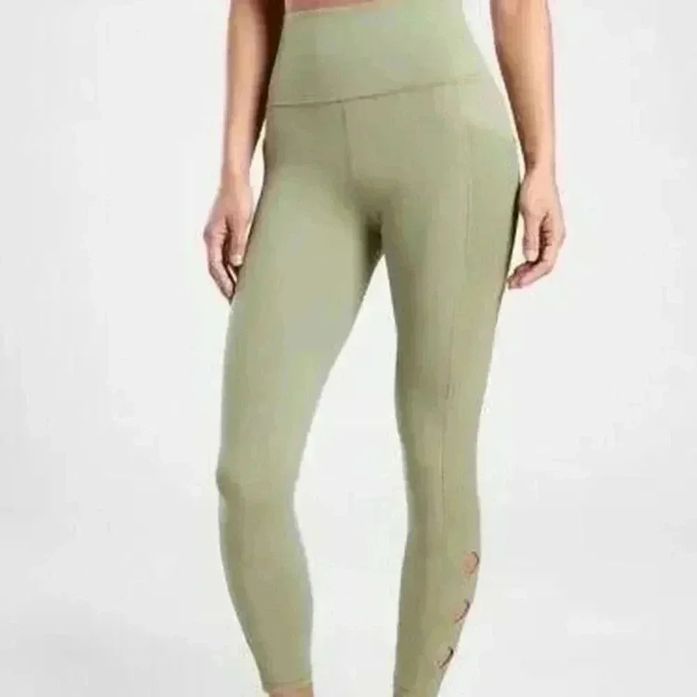 Athleta Salutation Stash Pocket II Cutout 7/8 Leggings Olive Green Sz XS #018